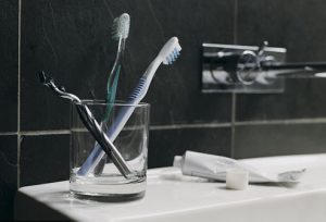 toothbrushes_in_bathroom